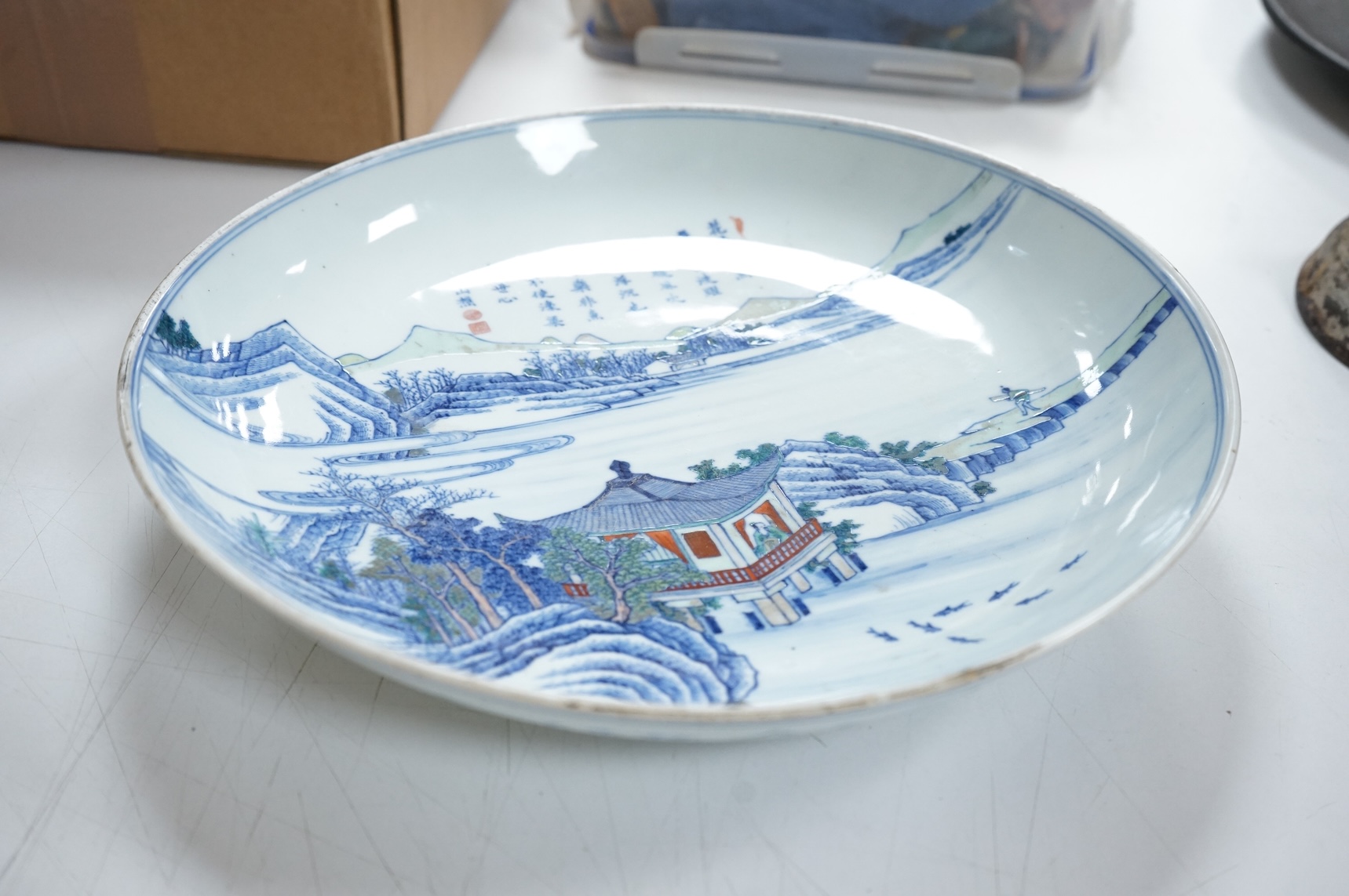 A Chinese inscribed doucai landscape charger, Kangxi mark, possibly Republic period, 33cm